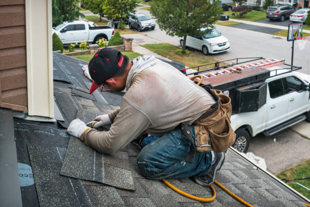 Professional Emergency Roof Repair technician working in Larchmont, NY